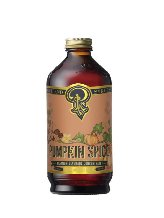 A bottle of Pumpkin Spice Syrup with a label depicting pumpkins and autumn-themed decorations.