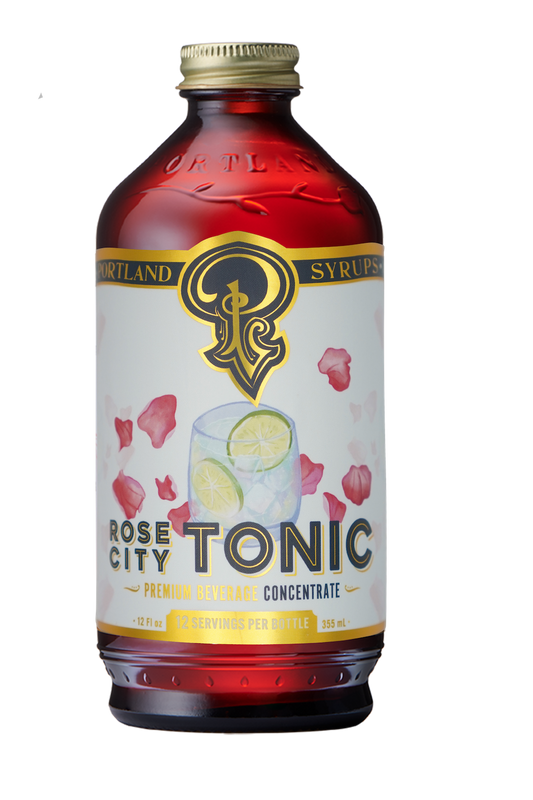Bottle of Rose City Tonic with a white label featuring a logo and text.