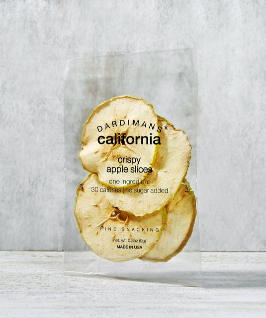 Packaged crispy apple slices with Dardimans branding on a light gray background
