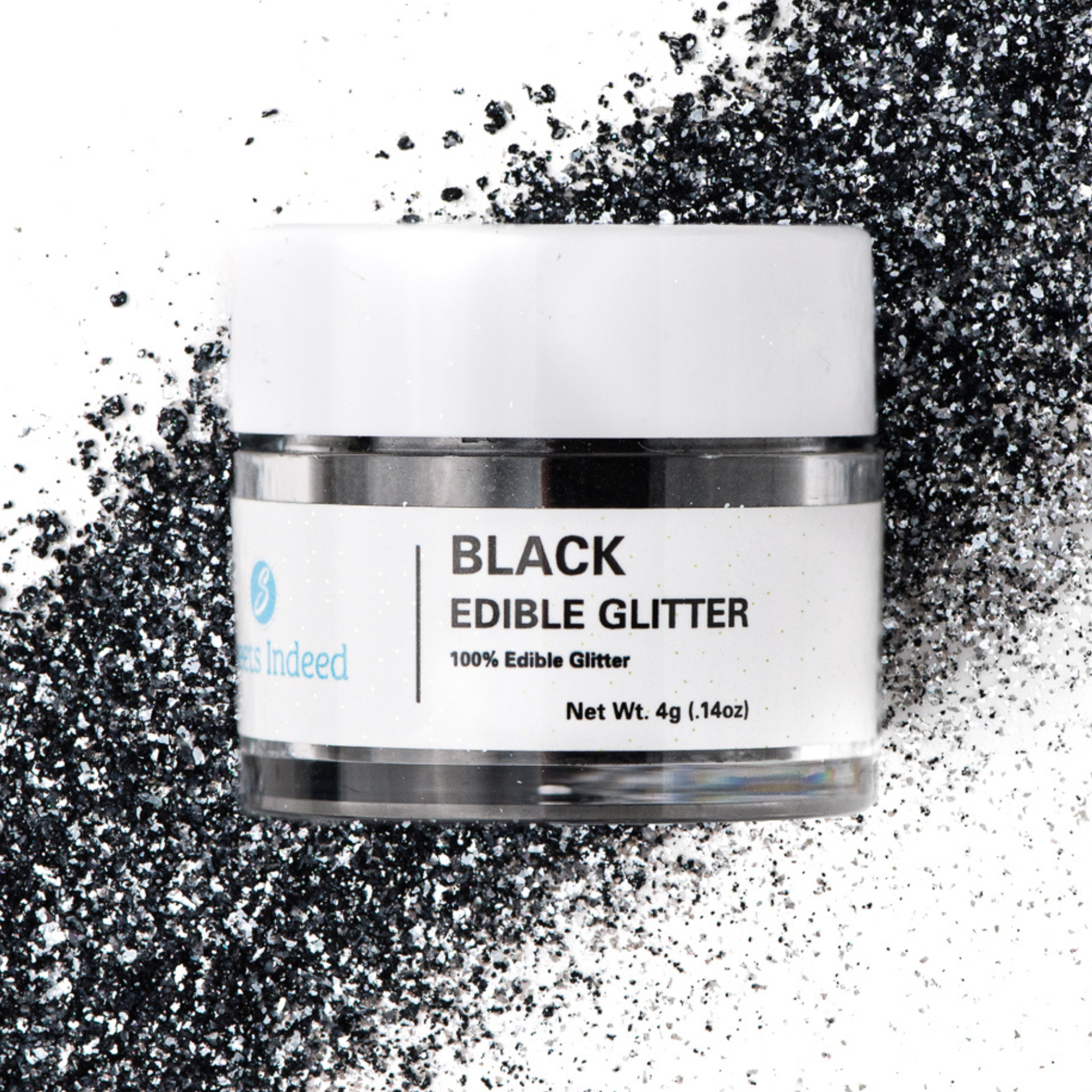 Jar of black edible glitter with a white label on a glittery background