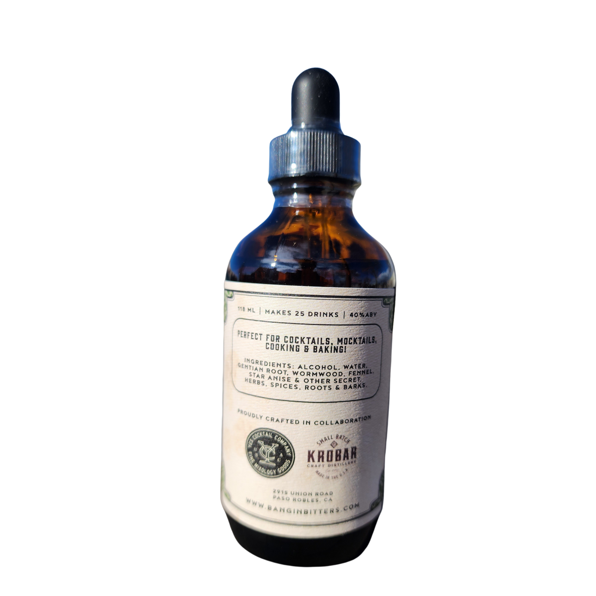 Bottle of Krogan bitters with a dropper on a white background
