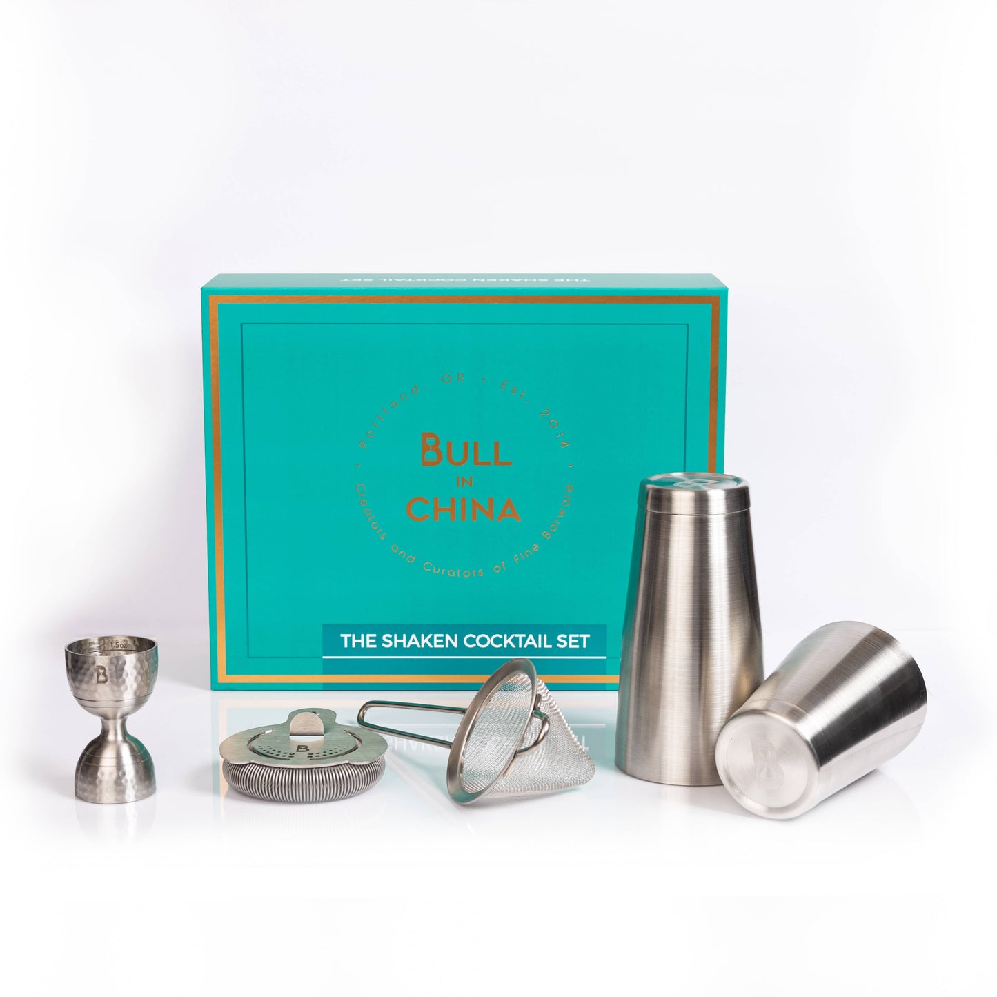 Bull in China cocktail shaker set with turquoise box on a white background