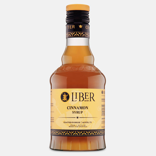 Bottle of Liber Cinnamon Syrup on a white background